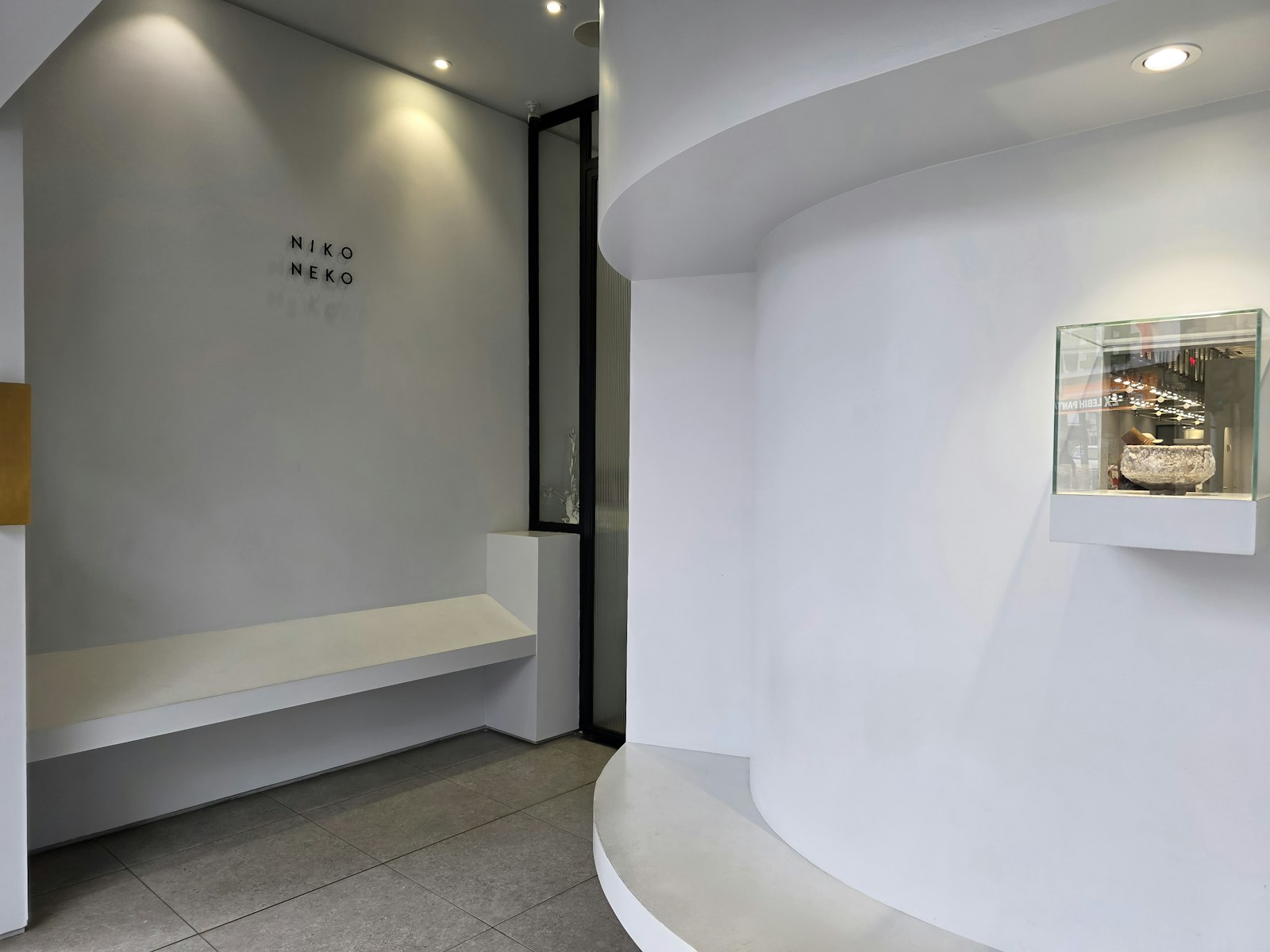 The reception area, minimal and bright.
