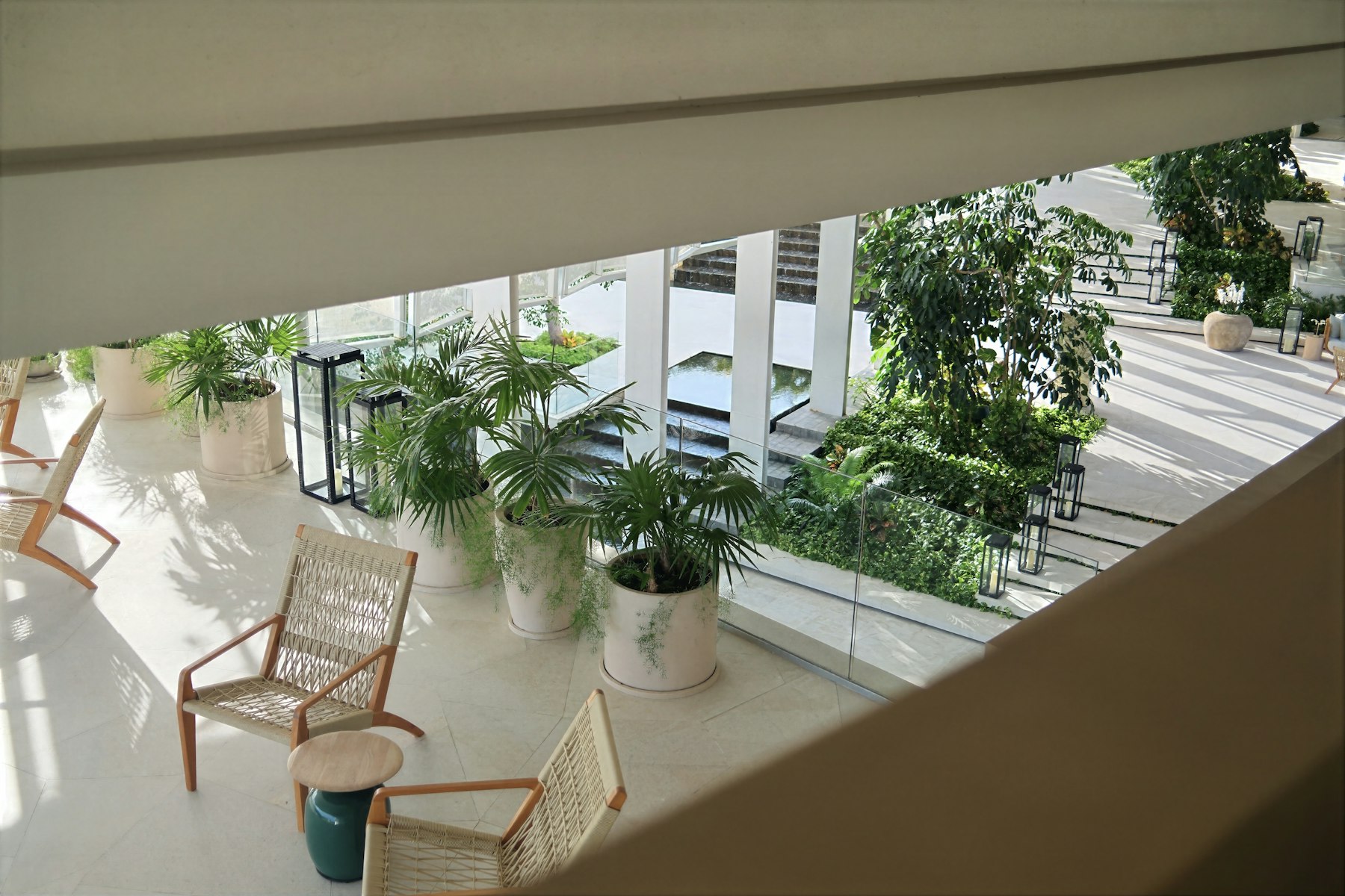 A lounge with armchairs and daylight.