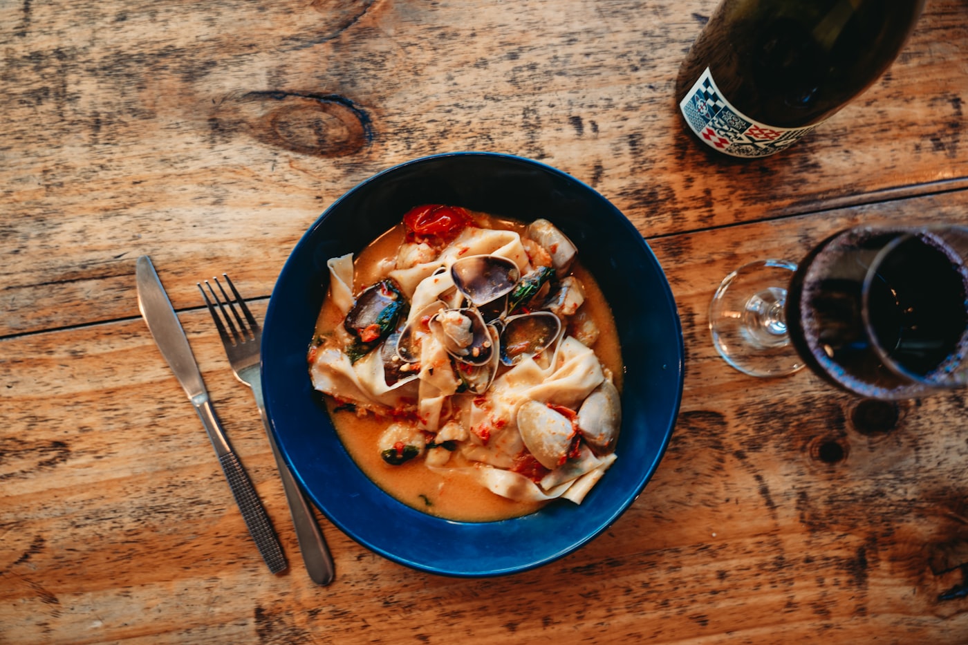 A seafood pasta dish photographed from above.